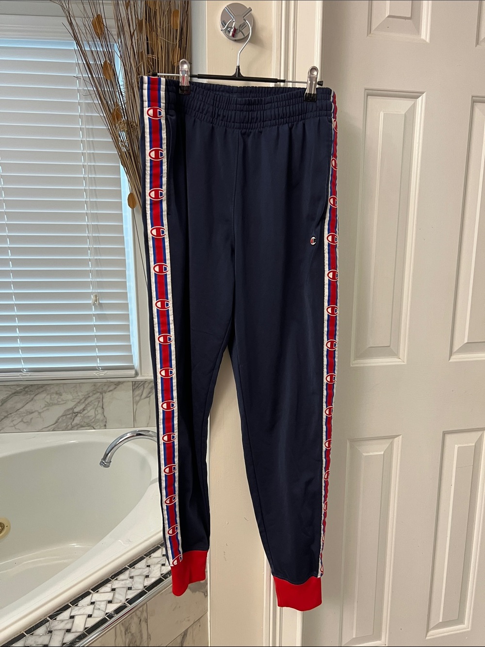 Champion Navy Joggers with Red Trim and Side Logo Tape